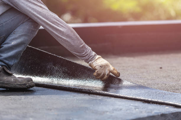 Professional Basement Waterproofing technician working in Bloomington, TX